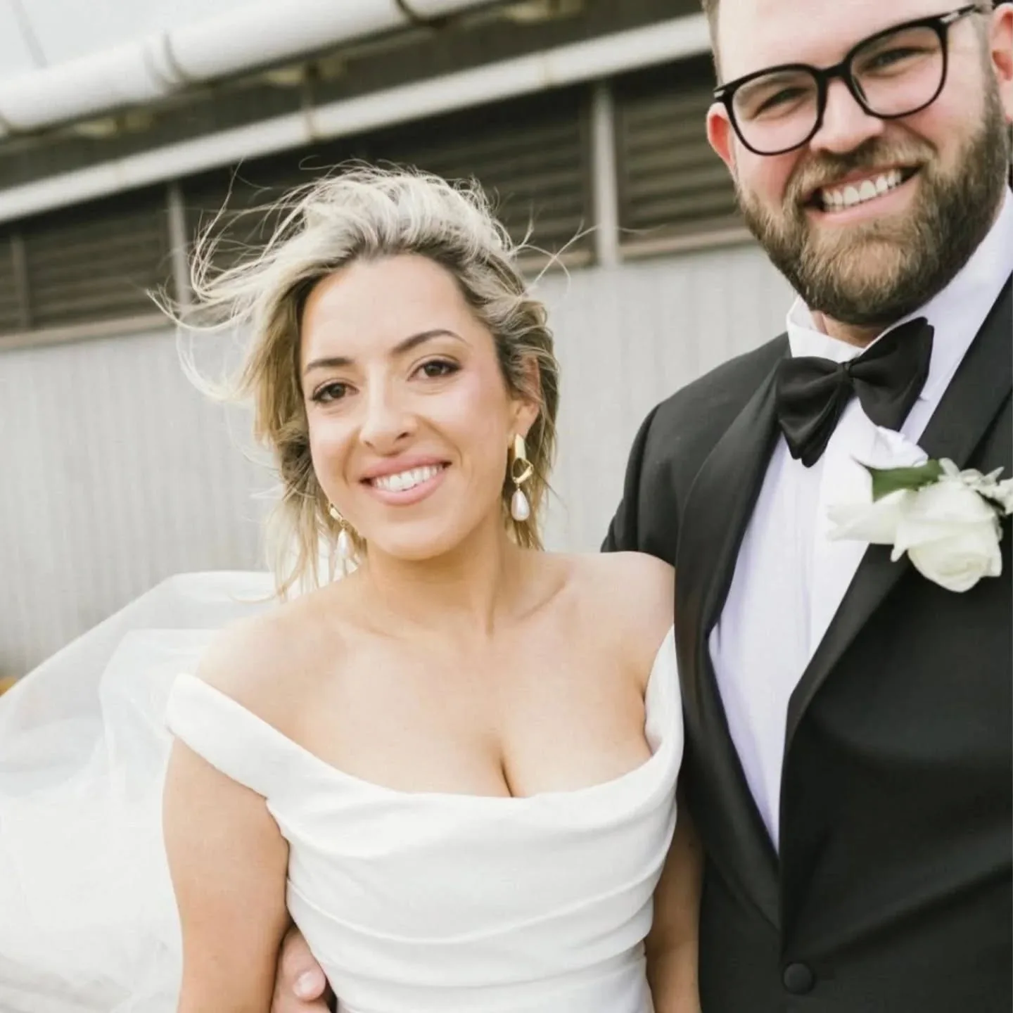 Bronzed bride and groom, close crop